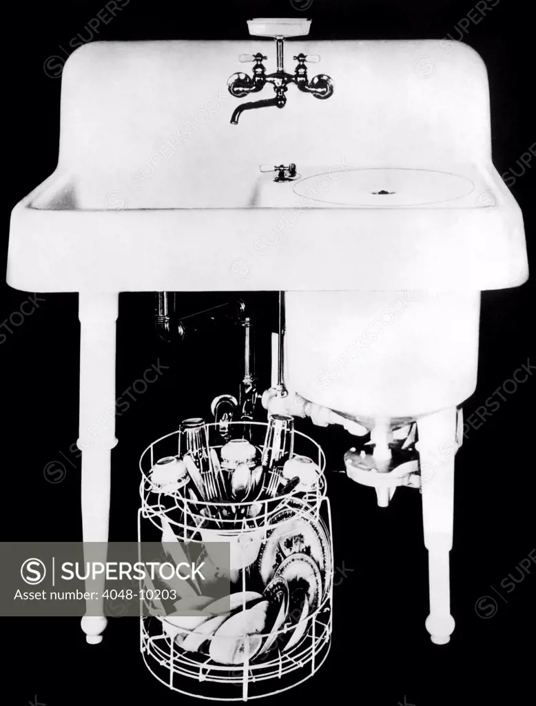 1920s Electric Dishwashersink. It had a heavy, enameled, cast-iron tub attached to a sink by 'U' bolts and a rubber gasket. The heavy dishwasher tub made installation difficult and expensive, and the machine developed problems with its gear reduction unit.