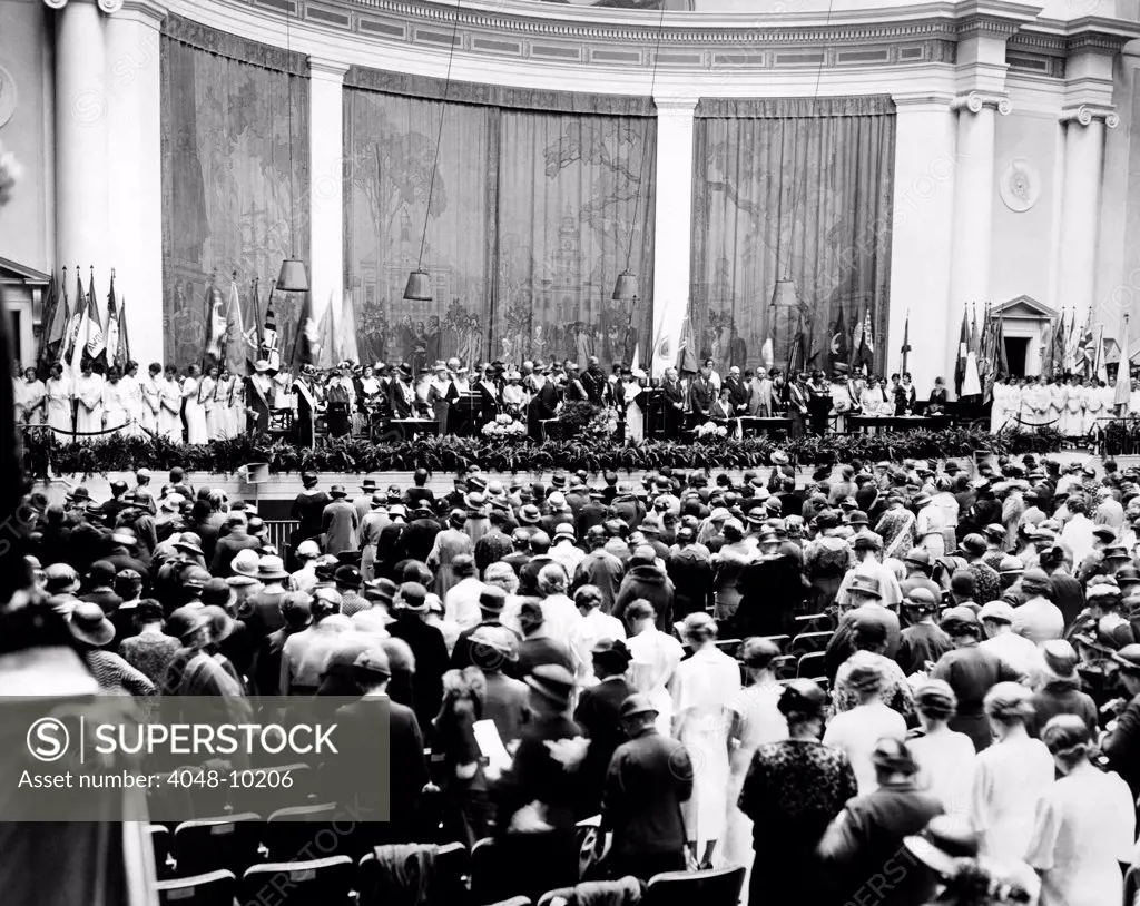 Daughters of the American Revolution begin their convention with a prayer in Constitution Hall. In 1938, the DAR refused to lease this auditorium for a concert by Marian Anderson because she was an African American. Washington, D.C. April 17, 1933.