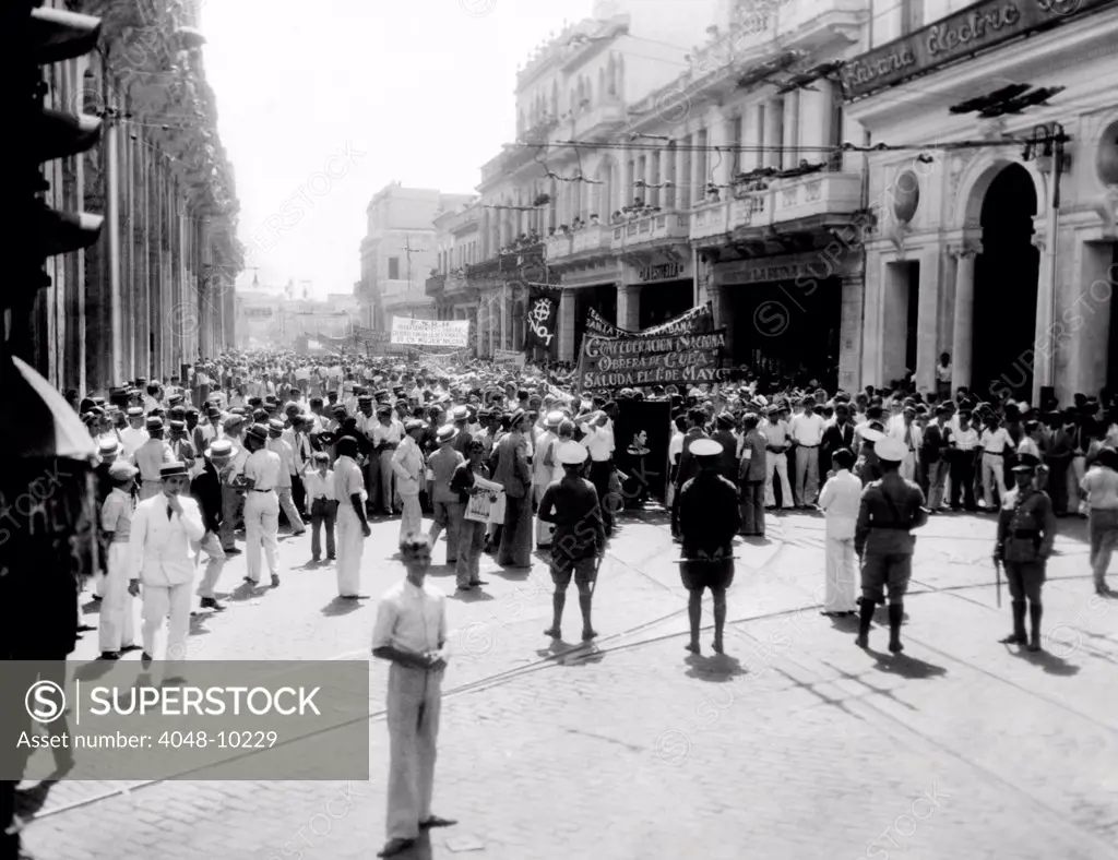 May Day 1934 riots in Cuba. When several hundred Communists marched in Havana, snipers fired into their ranks. The Reds suspected the shooters was from the 'ABC', a rightist secret political society. May 1, 1934.