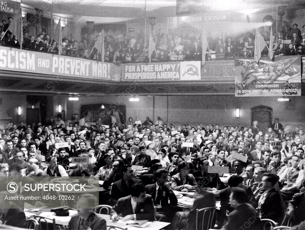 General view of the Communist National Convention at the Metropolitan Opera House. One banner reads, 'Communism is 20th Century Americanism'. June 24, 1936.