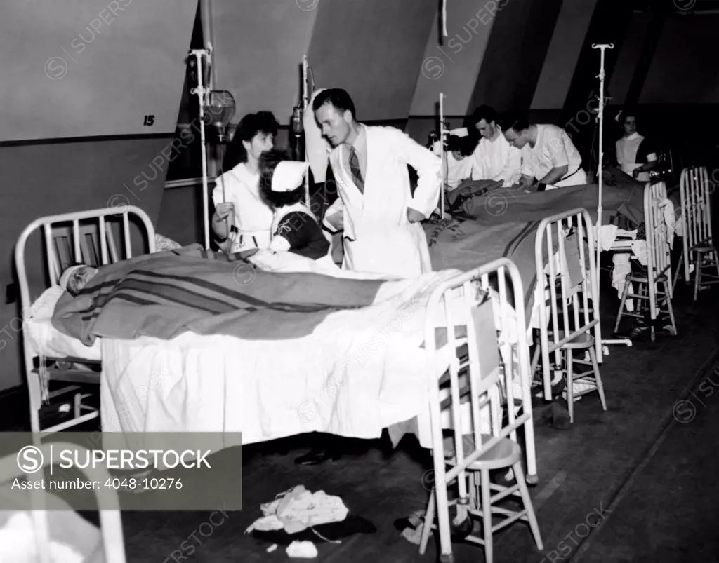 Coconut Grove Nightclub Fire. Hospital ward treats some of the 214 the injured survivors of the fire. Nov. 29, 1942.