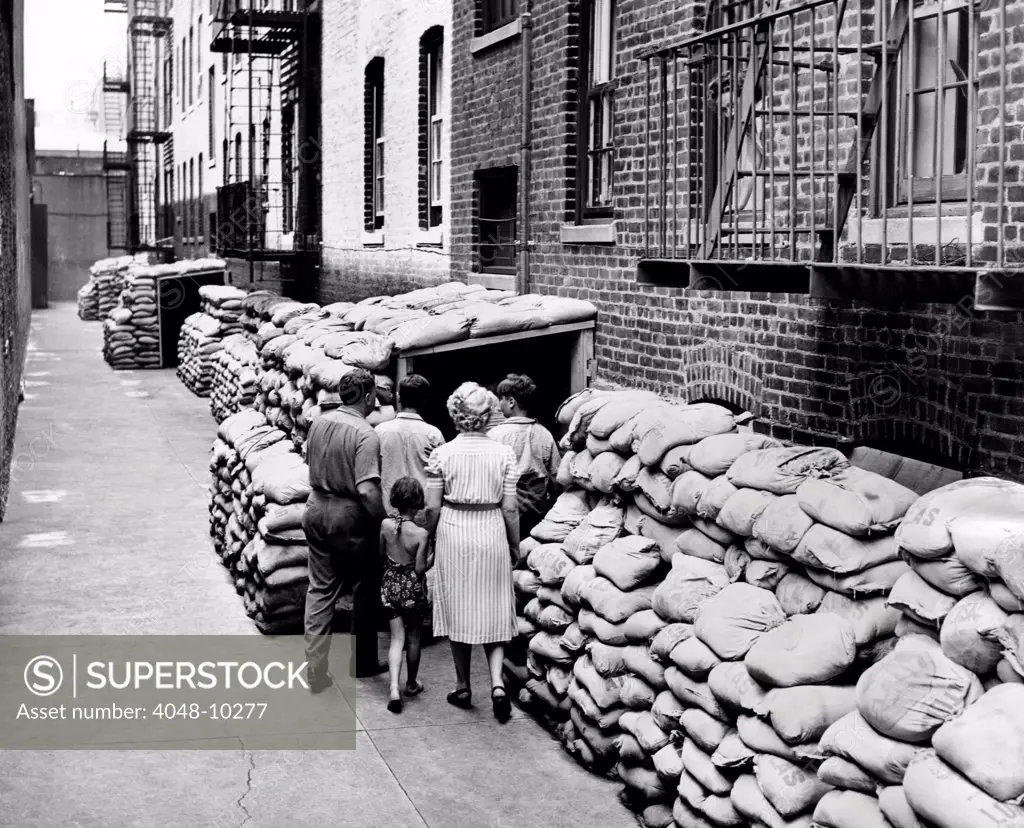 Exterior view of the first large air raid shelter on New York City's Lower East Side. It was half a block long and is protected by 4,000 sandbags. July 13, 1942.