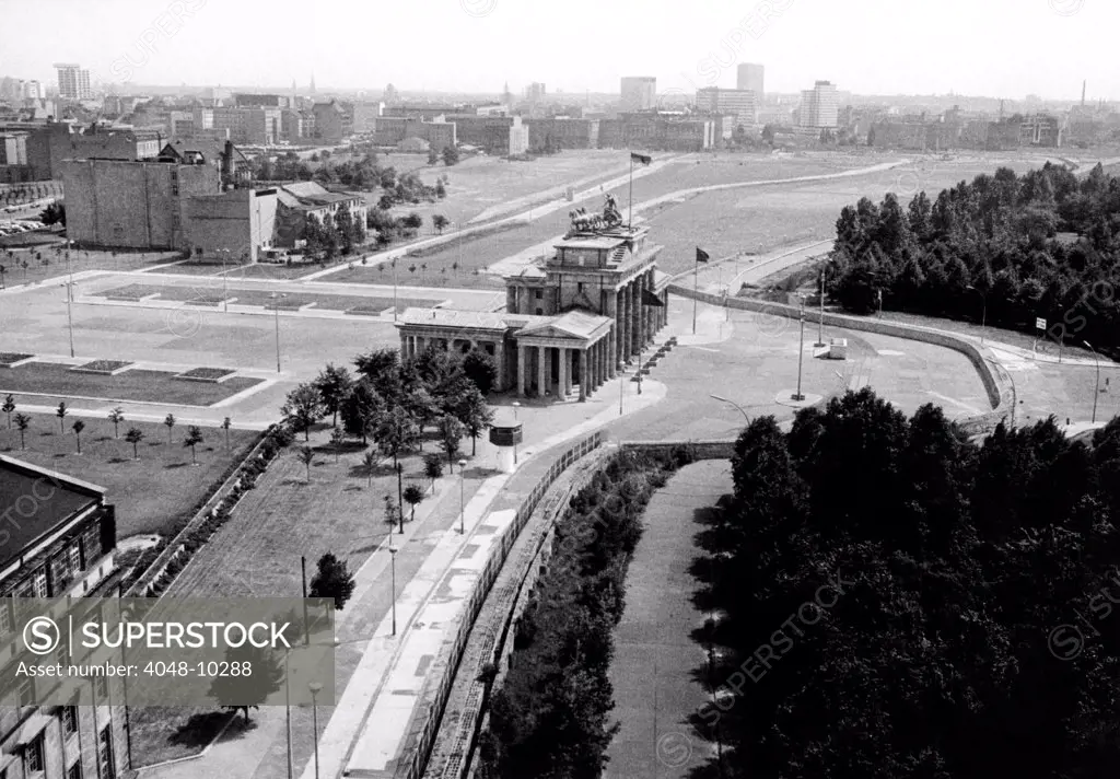 Aerial view of Brandenberg Gate, where the Berlin Wall forms a loop. East Berlin stretches into the distance. Aug. 6, 1969.