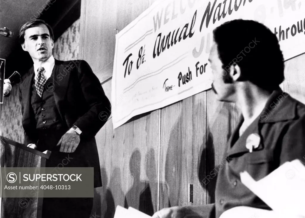 California Gov. Jerry Brown spoke to final session of Operation Push. At right is Rev. Jess Jackson, leader of Operation Push. July 14, 1975.