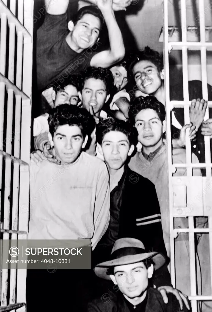 Zoot Suit Riots in Los Angeles. Youthful Zoot Suiters, all packed into a Los Angeles jail cell during the undeclared war between service me and Zoot Suiters. June 8, 1943.