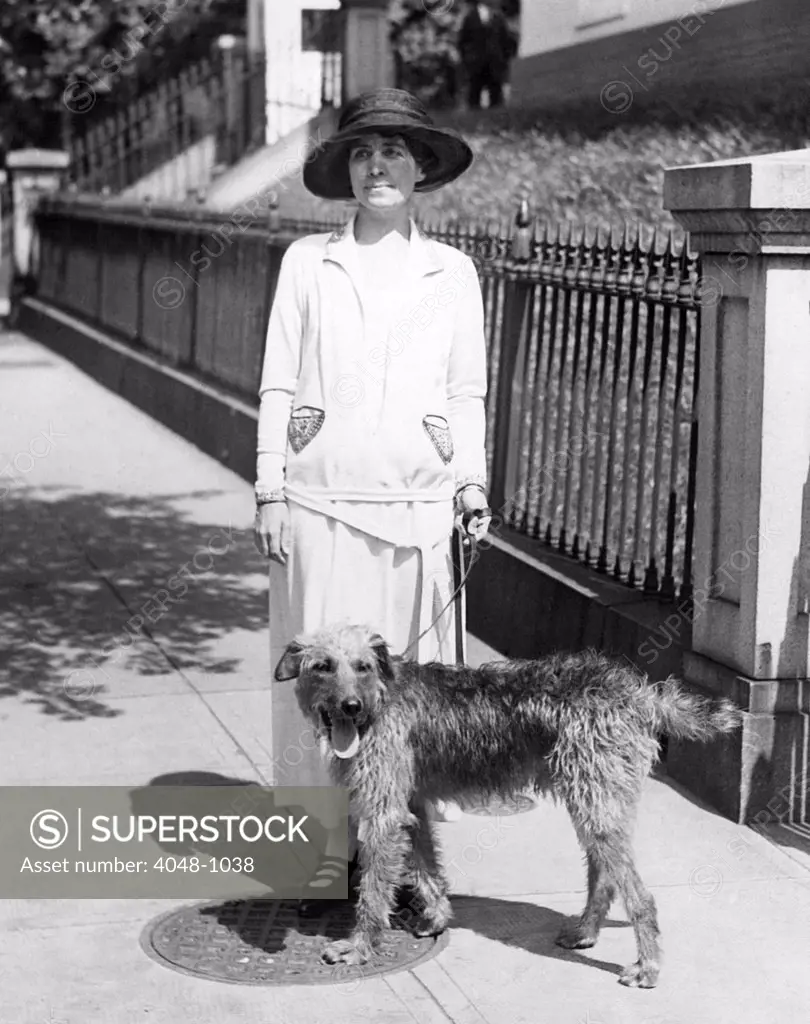 First Lady Grace Coolidge takes the dog out for a walk, 1924