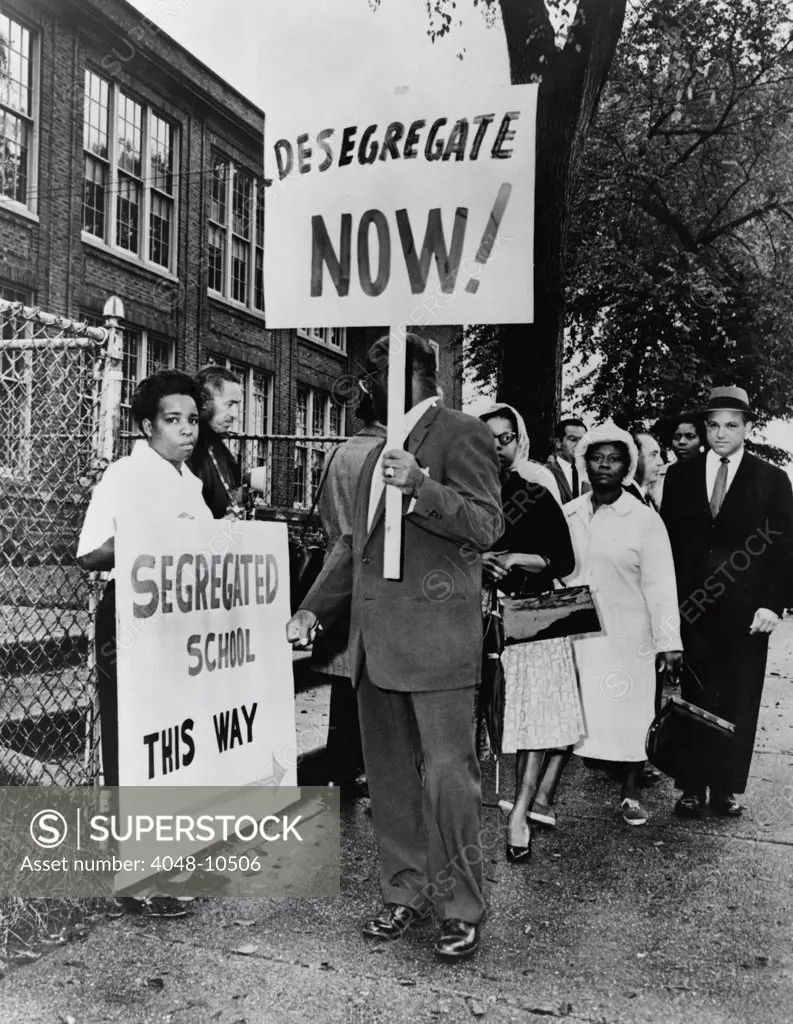 Africans American protest school segregation. Pickets outside Lincoln School in Englewood, N.J. were protesting the northern city's failure to end racial segregation. 1962.