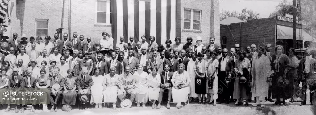 Convention of the National Association for the Advancement of Colored People, June 24-30, 1925, Denver, Colorado. Sitters include NAACP staff: Walter White, Robert Bagnall, and James Weldon Johnson.