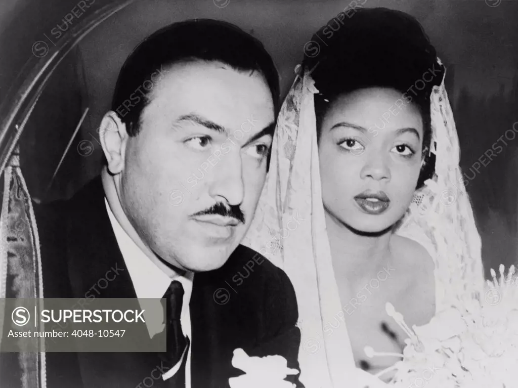 Harlem Congressman marries Jazz Singer. Adam Clayton Powell, Jr. and his bride, Hazel Dorothy Scott, on their 1945 wedding day. They had one child, Adam Clayton Powell III, but divorced in 1960.
