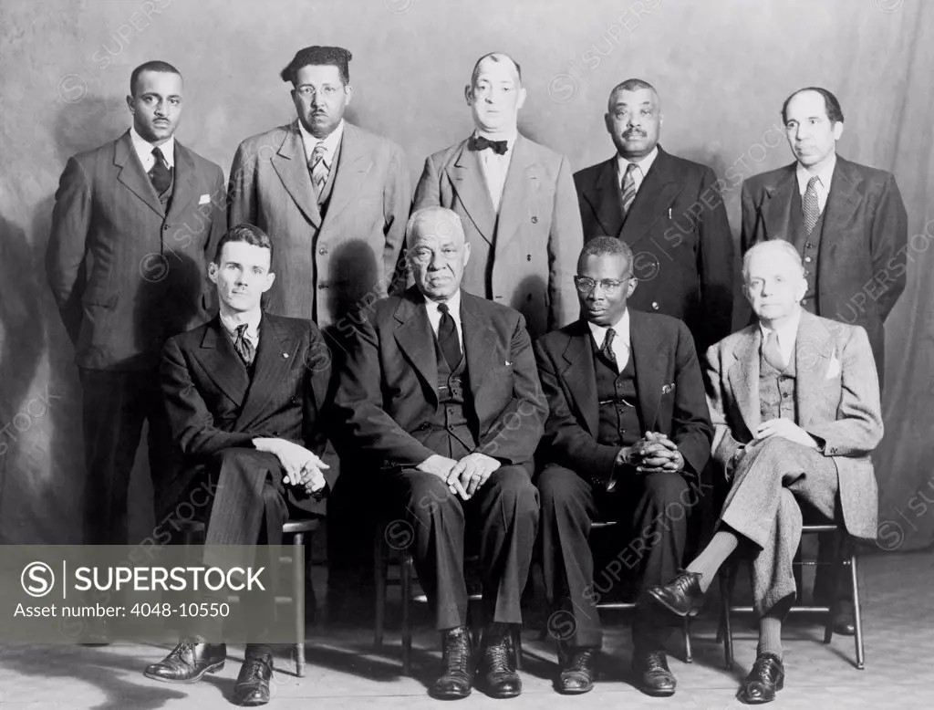 Five African American defendants and their NAACP counsel in Columbia, Tennessee 'Riot' case. Seated L-R: Maurice Weaver, Julius Blair, Alexander Looby, and Walter White. Standing left to right: James Martin, James Morton, Charles Blair, Saul Blair, and M.G. Ferguson. Ca. 1946.