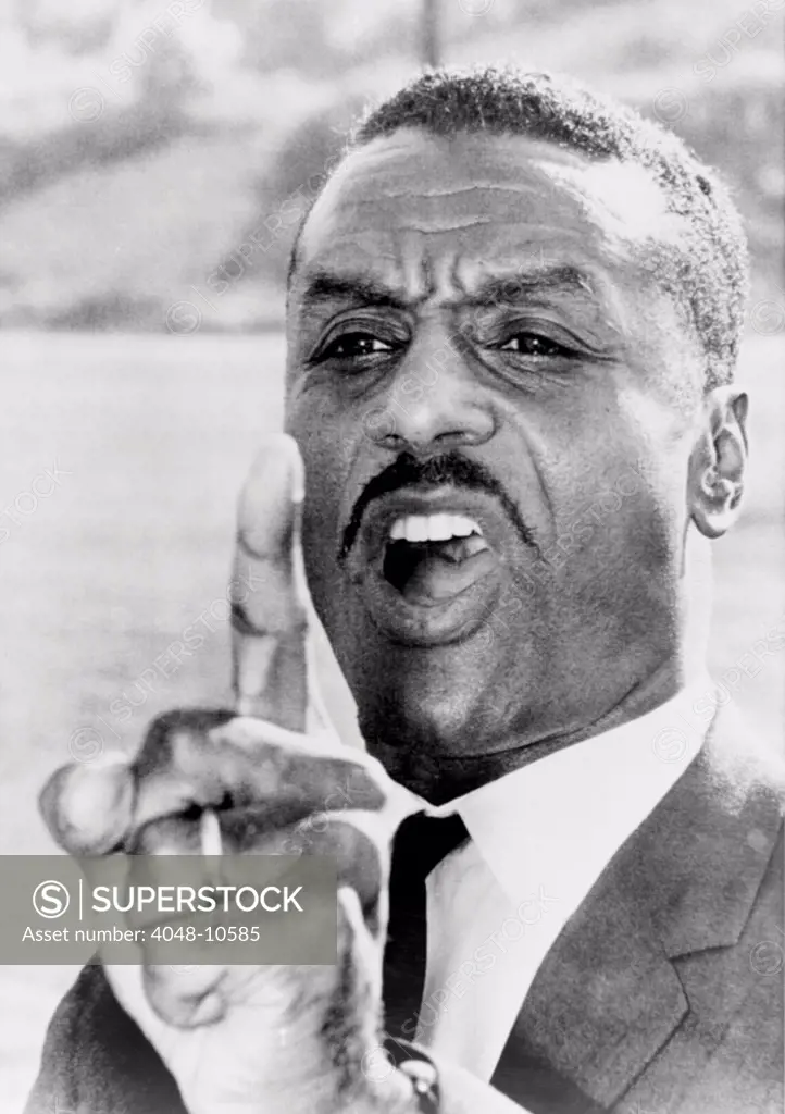 Fred Shuttlesworth, points a finger in warning to Birmingham city officials during the 1963 Civil Rights campaign in the 'most segregated city in the United States.'.