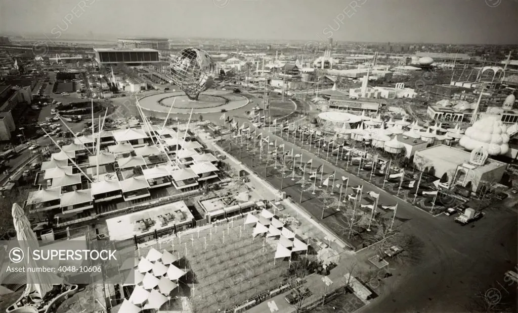 Aerial view of Unisphere and other exhibits at New York World's Fair in 1964. In the far background is the then new Shea Stadium.