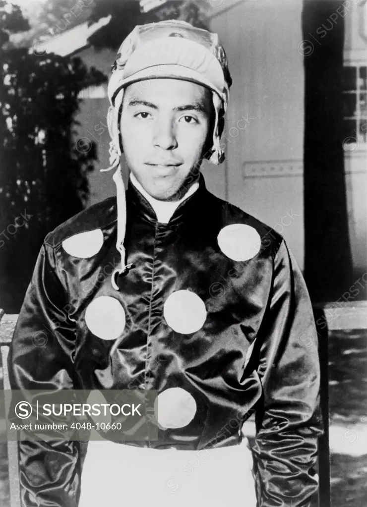 Angel Cordero dressed in racing silks in 1964. He raced for over 25 years, winning over 5,000 races.
