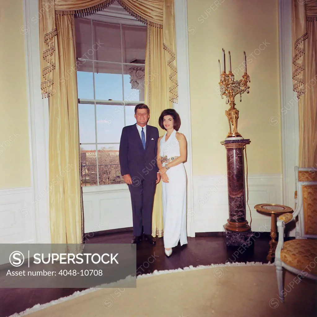 President and Jacqueline Kennedy in the White House Oval Room.