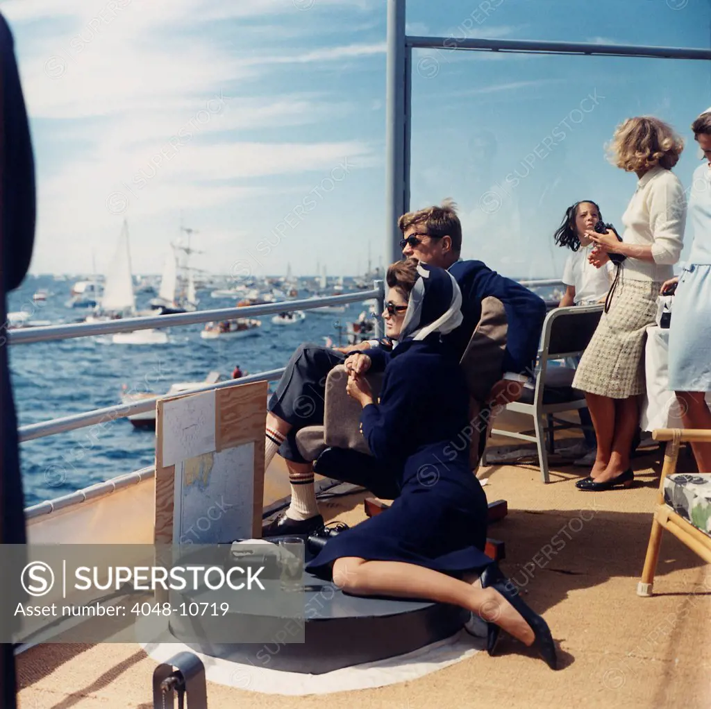 President and Jacqueline Kennedy watch the America's Cup Race from the Deck of the USS Joseph P. Kennedy, Jr. The race was off Newport, Rhode Island, on Sept. 15, 1962.