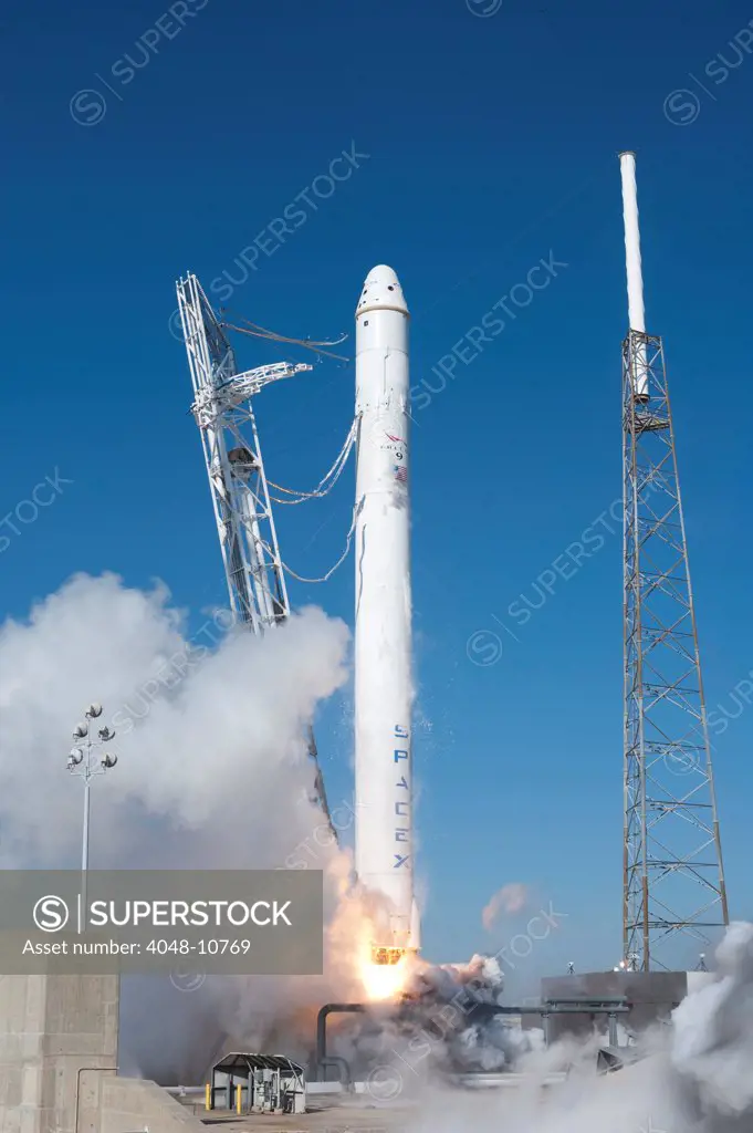 SpaceXs Falcon 9 rocket and Dragon spacecraft lift off from Cape Canaveral Air Force Station. The Dragon spacecraft completed two orbits, then splashed down in the Pacific Ocean. SpaceX is the first commercial company to successfully return a spacecraft from orbit. Dec. 8, 2010.