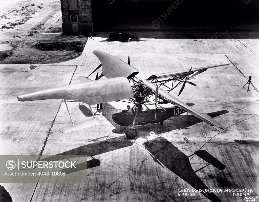 Early helicopter. Curtiss Bleaker Helicopter at Langley Air Force Base in June 1930. It has massive wing-like rotors attached to a light plane body.