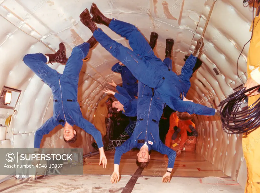 Space shuttle astronauts in zero gravity training. L-R: Richard Covey, Steven Nagal, and George Nelson.