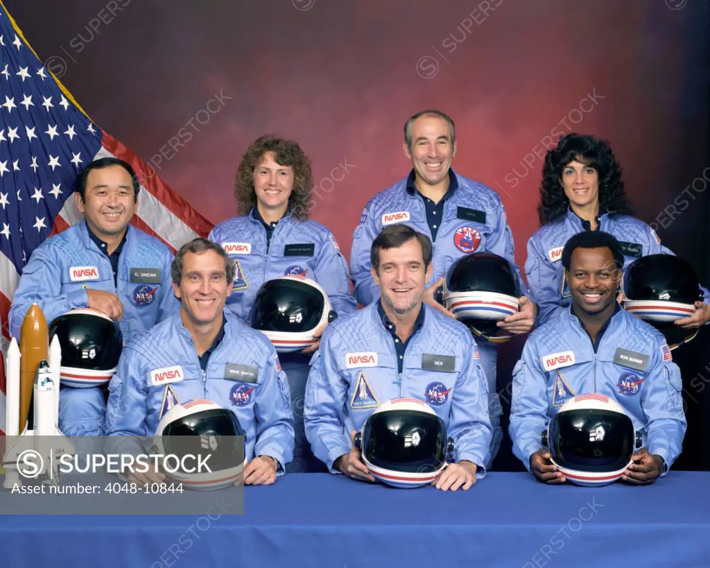 Crew portrait of the Challenger astronauts who died when the shuttle exploded during launch on Jan. 28, 1986. Back row L-R: Ellison Onizuka, Christa McAuliffe, Greg Jarvis, and Judy Resnik. Front Row: Mike Smith, Dick Scobee, and Ron McNair.
