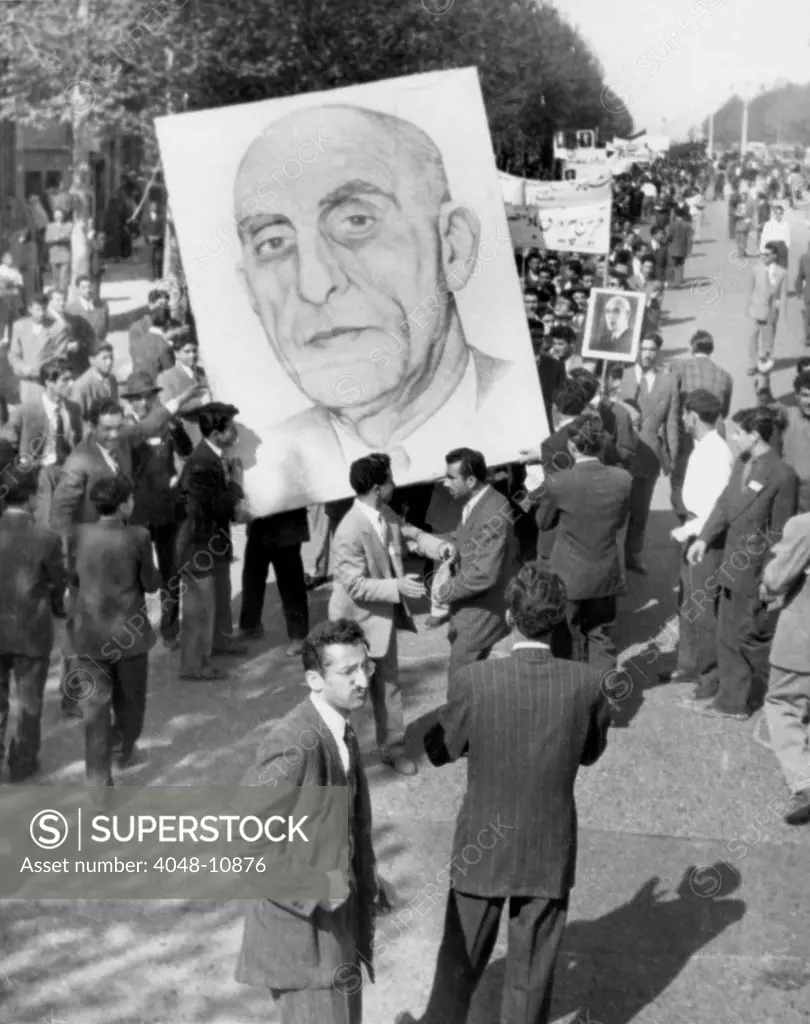 Iranians, demonstrating in favor of the nationalist Premier Mohammed Mossadegh, in 1953. In spite of popular support British-American covert operations prompted an anti-Russian scare campaign that resulted in Mossadegh's disposition.