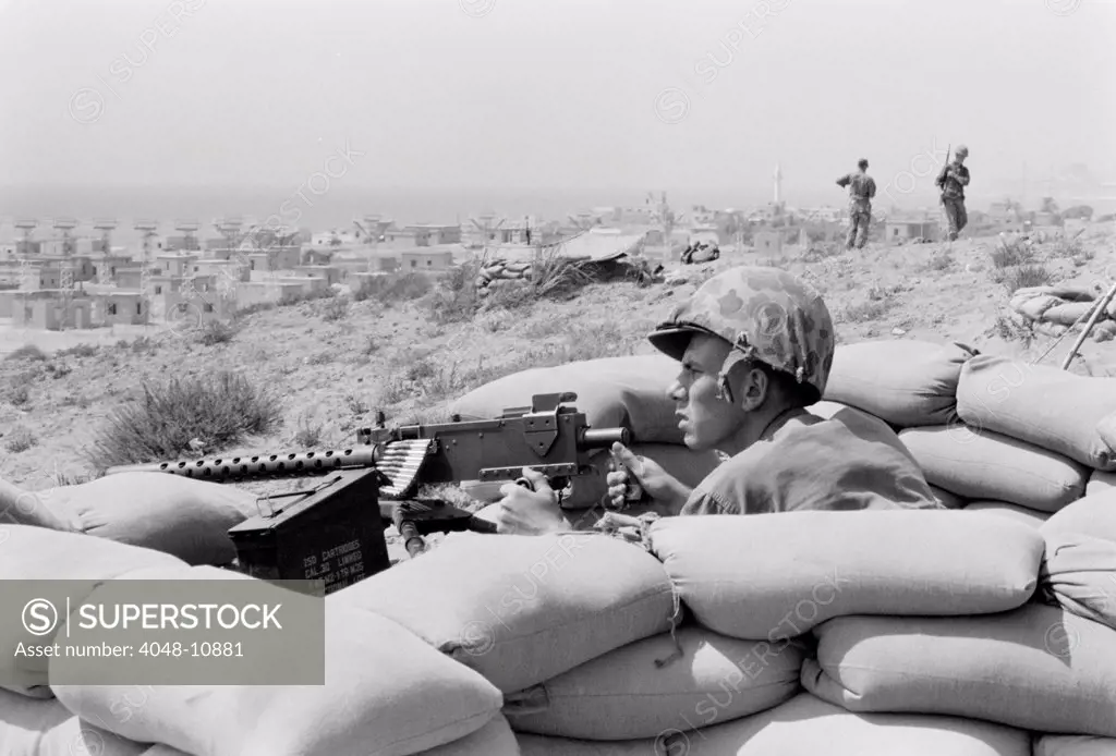 US Marine in a foxhole in Beirut, Lebanon. The United States intervened to prevent conflict between the Pro-western Maronite Christians and Muslims Arab nationalists. July 1958.
