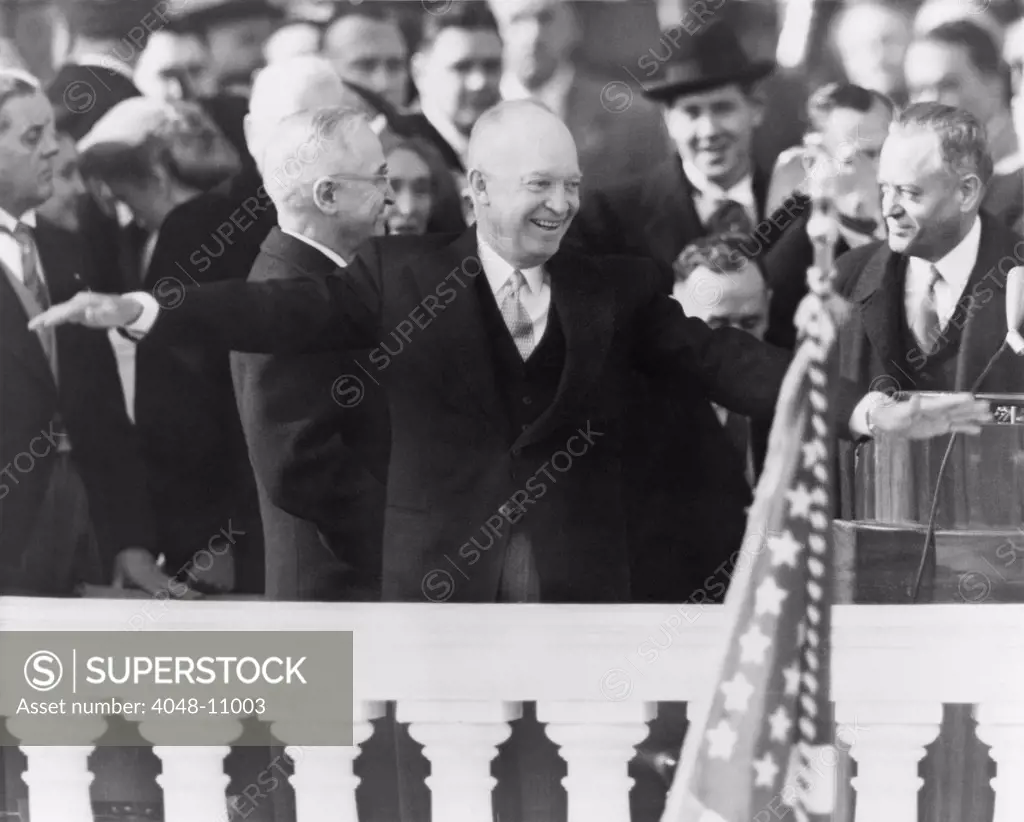 Eisenhower's First Inauguration. President Dwight Eisenhower accepts the cheers of the crowd after his inauguration, with Harry Truman and Senator Styles Bridges looking on. January 20, 1953.