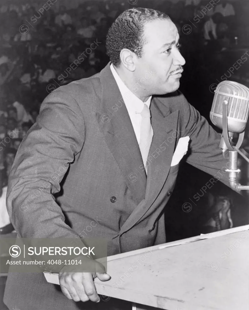 Benjamin J. Davis speaking at the Negro Freedom Rally, Madison Square Garden, New York City. June 25, 1945. He was an admitted communist who represented Harlem on the New York City Council from 1943-1949.