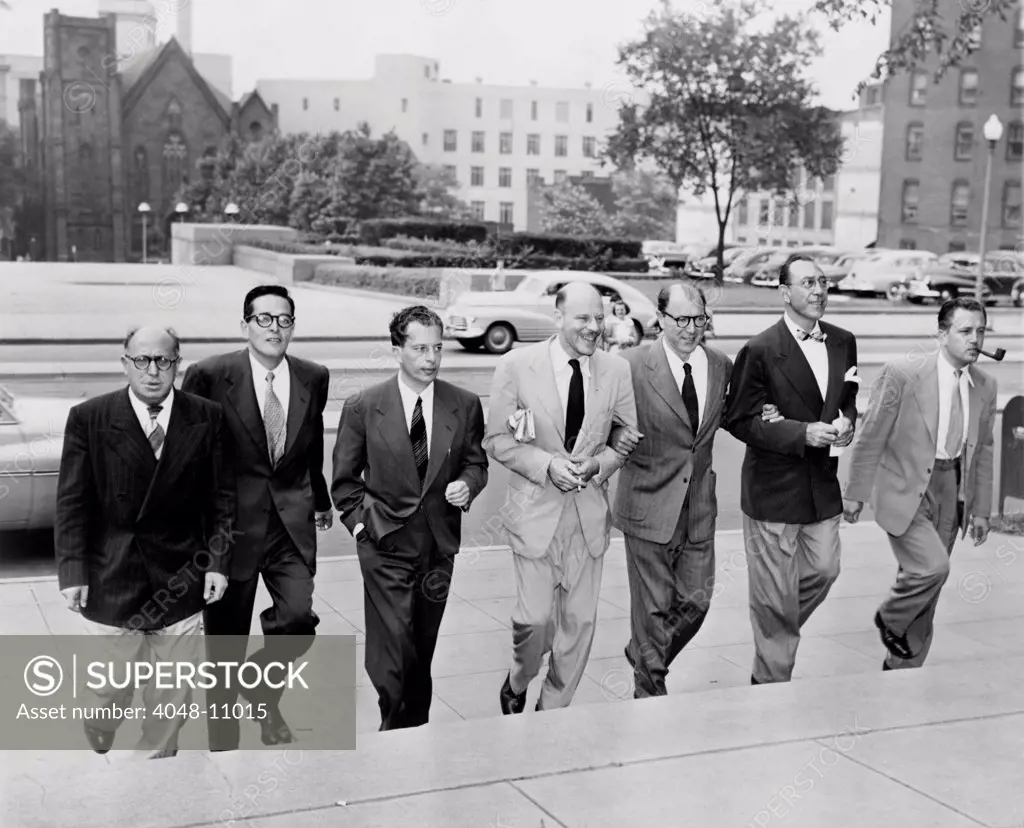Hollywood writers go on trial. Seven Hollywood writers and directors arrive at court for trial on contempt of Congress. L-R: Samuel Ornitz, Ring Lardner , Albert Maltz, Alvah Bessie, Lester Cole, Herbert Bieberman, and Edward Dmytryk. They were charged for their defiance of the House Un-American Activities Committee (HUAC). June 20, 1950.