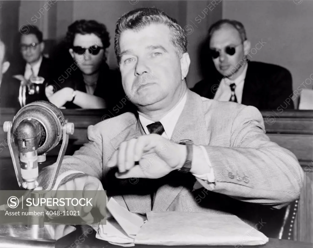 Robert Rossen, movie producer, testifying before the House Un-American Activities Committee (HUAC) in 1953. Rossen had been a member of the American Communist Party from 1937 to 1947. He was blacklisted in 1951 when he refused to testify to the HUAC. In 1953, at his second HUAC appearance he named 57 people as current or former Communists and was removed from the blacklist. His most notable films were ALL THE KINGS MEN (1949) and THE HUSTLER (1961).