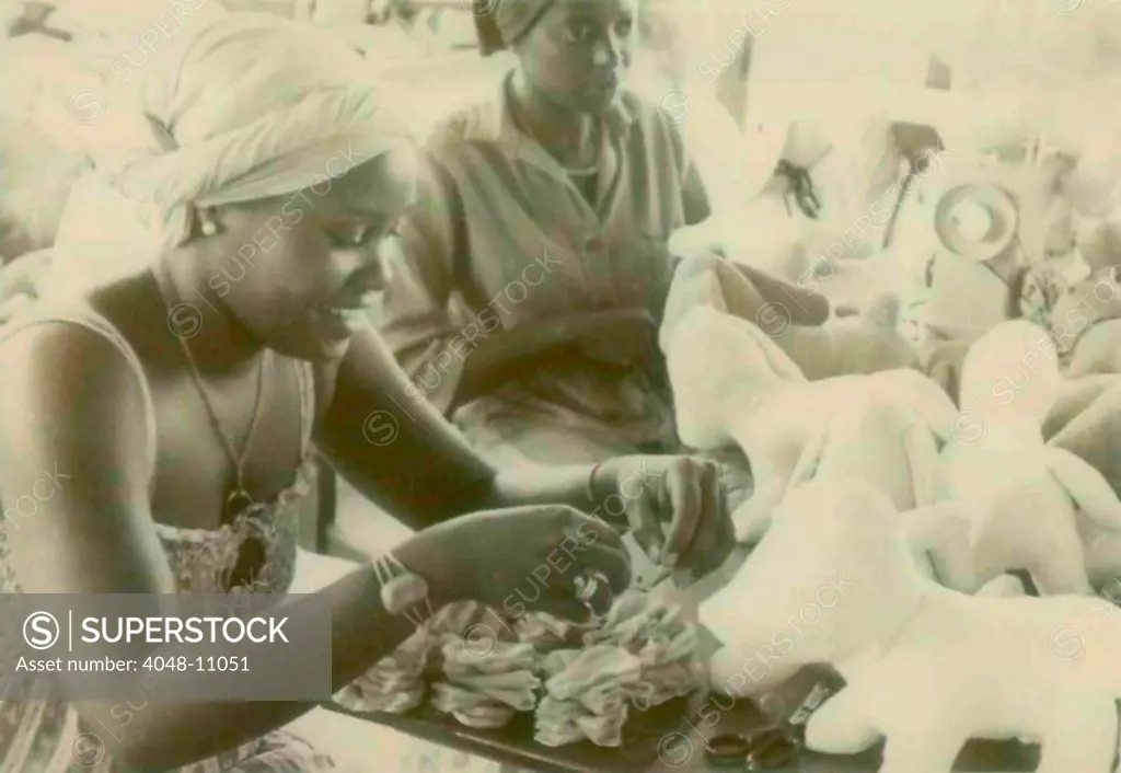 Woman making stuffed animals at the People's Temple Agricultural Project. Jonestown, Guyana. Nov. 1978.