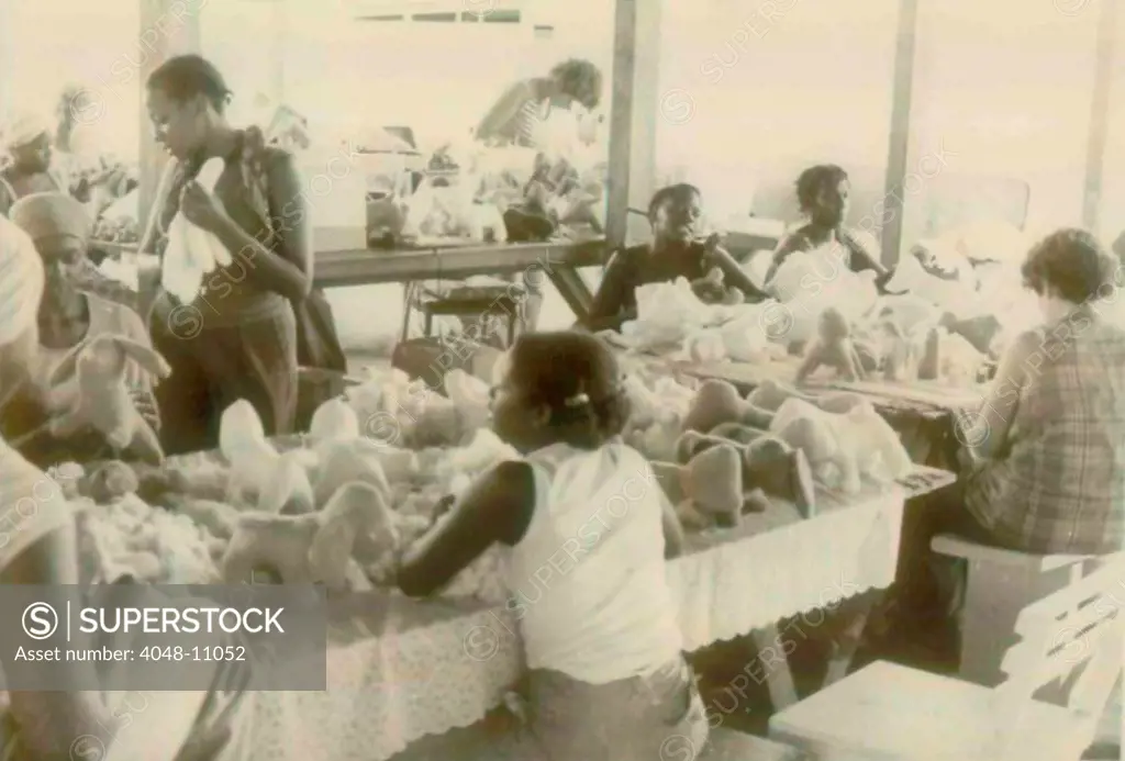 Woman making stuffed animals at the People's Temple Agricultural Project. Jonestown, Guyana. Nov. 1978.