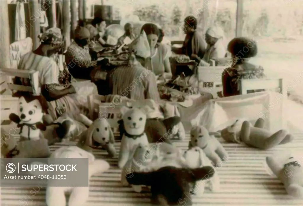 Women residents making stuffed animals. People's Temple Agricultural Project. Jonestown, Guyana. Nov. 1978.