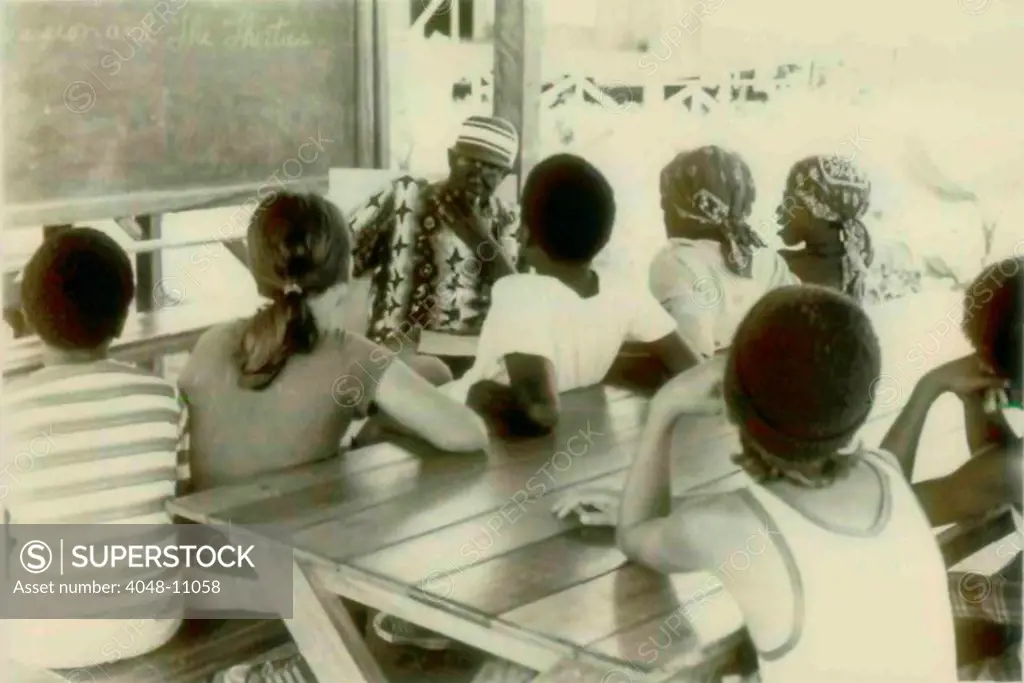 School with Henry Mercer is teaching the students. People's Temple Agricultural Project. Jonestown, Guyana. Nov. 1978.