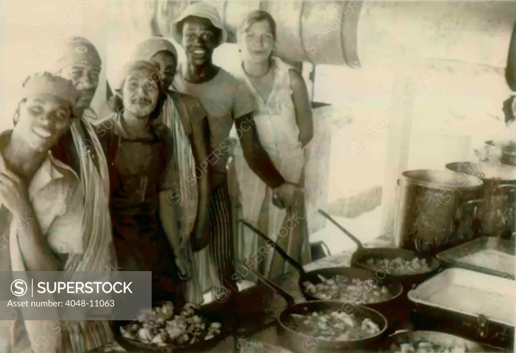 Kitchen workers at the People's Temple Agricultural Project. From back to front: Karen Harmes, Stanley Clayton, unidentified, Santiago Rosa, and two unidentified. Jonestown, Guyana. Nov. 1978.