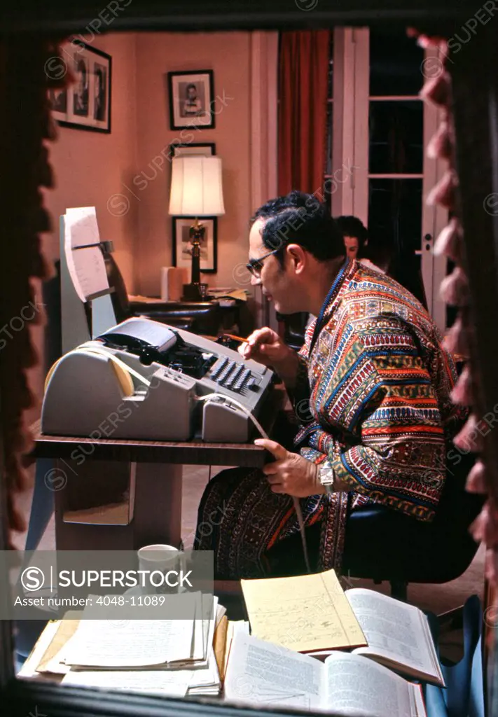 Dr. Theodore Rodman of Ardmore PA at work on his home computer, 1970. The computer system, known as 'time-sharing,' consisted of a teletype terminal connected to a big central unit via telephone. The cost was $110 per month to rent, plus $7.50 per hour of use. Photo: John G. Zimmerman Archive/Courtesy Everett Collection