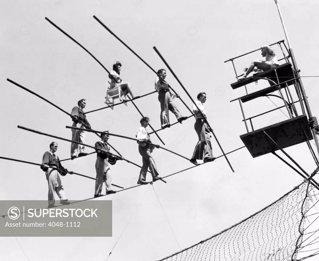 The Flying Wallendas, a circus act known for performing stunts without safety nets, practicing their act, 1947.