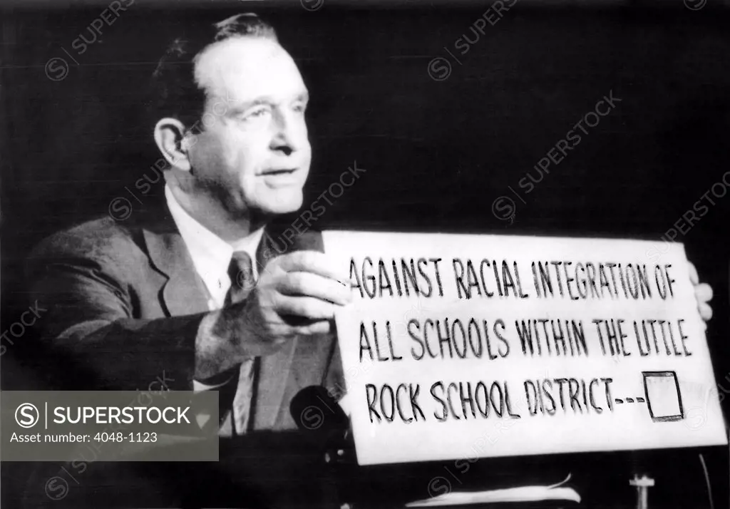 Governor Orval Faubus (D) appears on TV program here late 9/26/58 urging voters to declare themselves ooposed to school integration in the 9/27/58 election that will decide the fate of Little Rock and Arkansas state schools, 9/27/58.