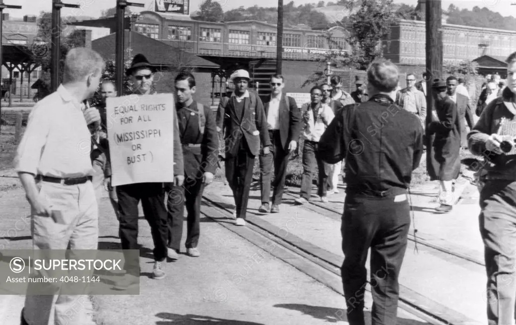 Men in the fight for Civil Rights participate in a memorial trek from Chatanooga, Tennesse to Jackson, Mississipi. They were honoring William Moore, was was killed in a similar walk, 1963