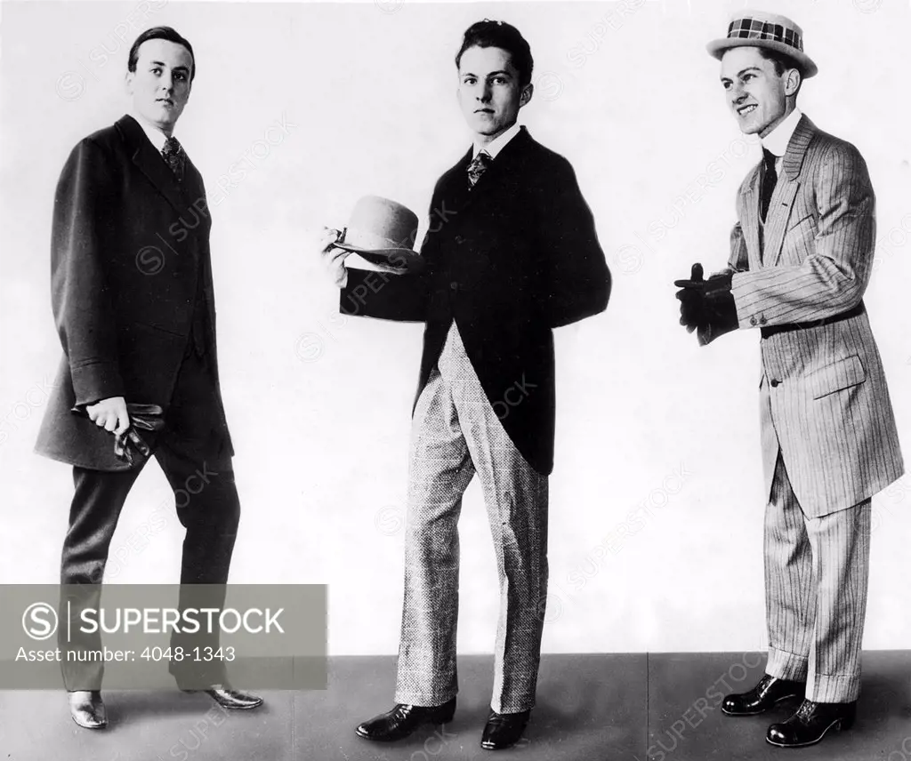 FASHION-Three gentlemen modeling fashions, from left to right, of 1917, 1927 & 1937.