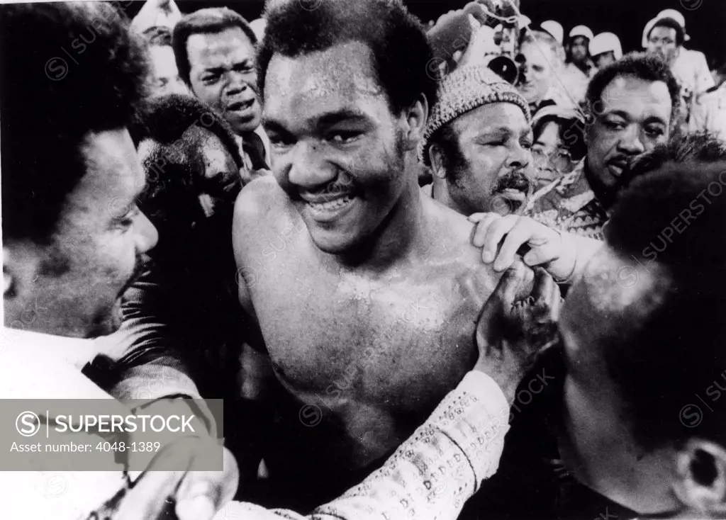 GEORGE FOREMAN- The boxer is congratulated in the ring after defeating Joe Frazier for the world heavyweight championship. Kingston, Jamaica 1/22/73
