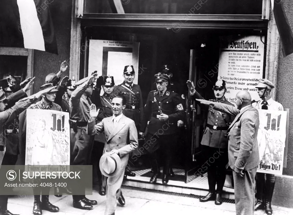Dr. GOEBBELS emerging from a polling place in Berlin after casting his vote for Hitler. October 27, 1934.
