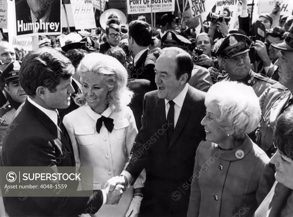 Foreground: Senator Edward M. Kennedy, Joan Kennedy, Vice President Hubert Humphrey, Muriel Humphrey, Logan International Airport, Boston, Massachusetts, September 19, 1968.