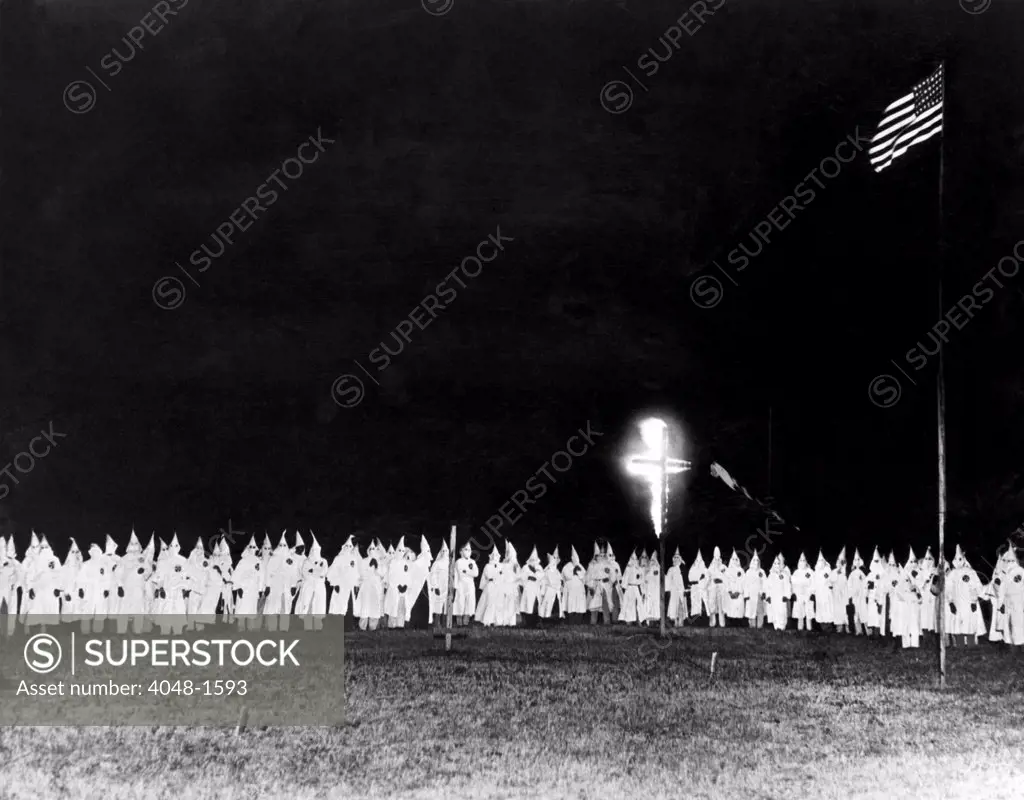 Members of the Ku Klux Klan meeting on private property on the outskirts of Oklahoma City to induct 350 new members, 1934.