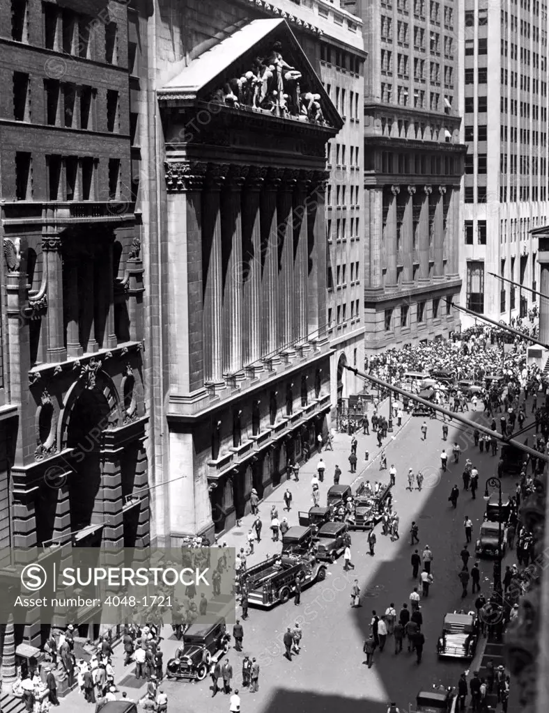 Acrid fumes from a tear-gas bomb spread through the N.Y. Stock Exchange;  photo shows emergency wagons outside the exchange. N.Y.C.  August 4, 1933.