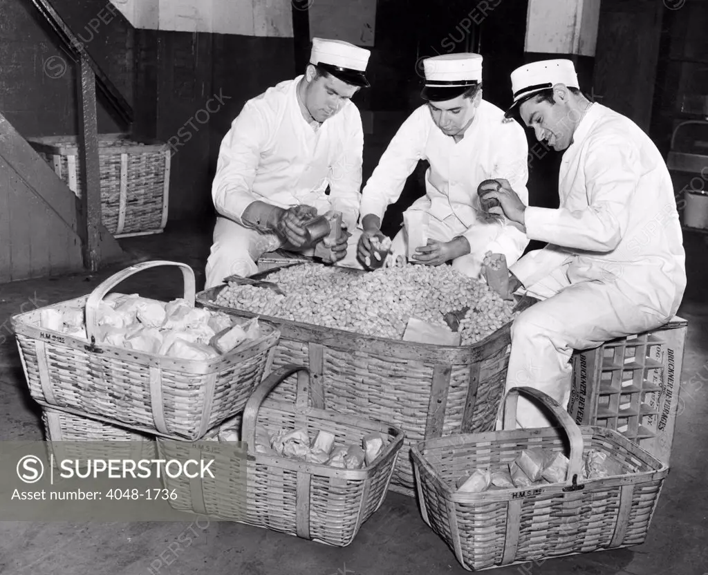 Vendors filling peanut bags at the World Series in Yankee Stadium, New York City, October 4, 1939.