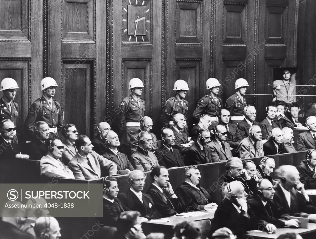 Nuremberg Trials,(first row) Hermann Goering, Rudolf Hess, Joachim von Ribbentrop,  Wilhelm Keitel, Ernest Kaltenbrunner, Alfred Rosenberg, Hans Frank, Wilhelm Frick, Julius Streicher, W. Funk, H. Schacht, (back row) K. Doenitz,  E. Raeder, B. von Schirach, F. Sauckel, A. Jodl, F. von Papen, A. Seyss-Inquart, A. Speer, C. von Neurath, H. Fritzsche,  1946