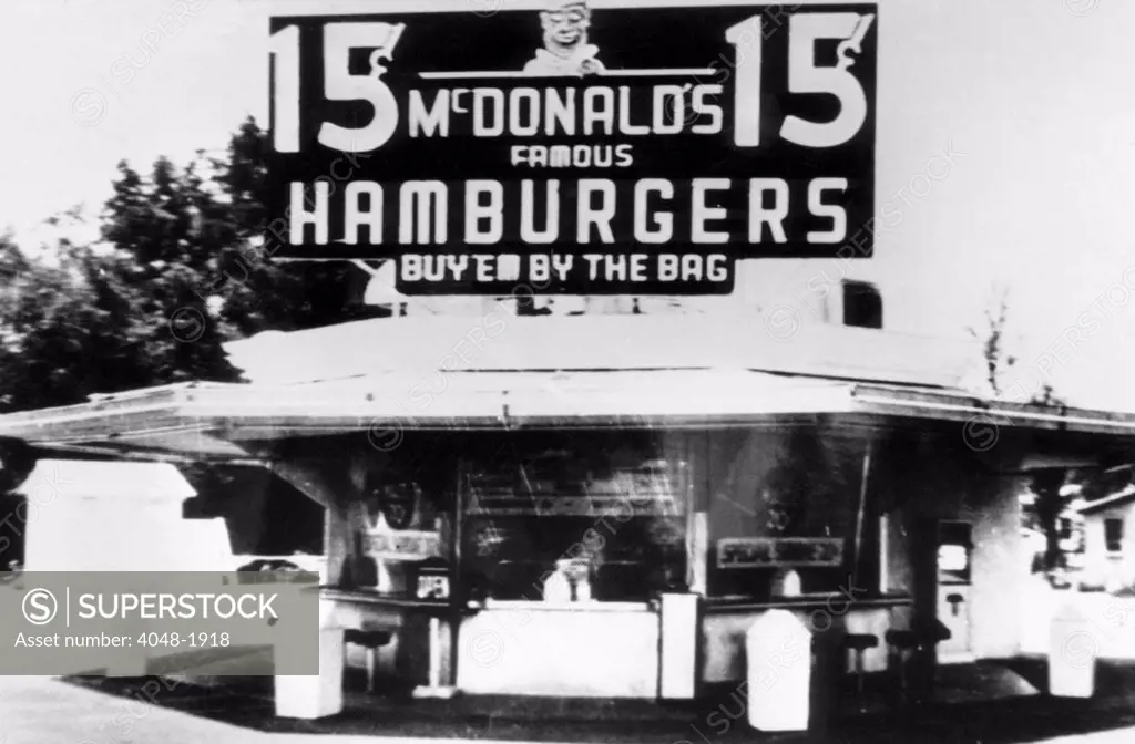 The original McDonalds restaurant, featuring a ten item menu built around a 15 cent hamburger, San Bernadino, California, c. 1955