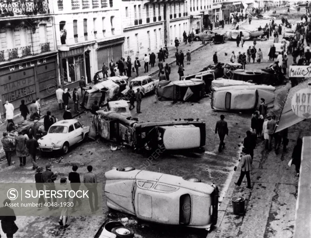 RIOTS-Auto Barricade on Guy Lussac Street in Paris during the riots of 1968.