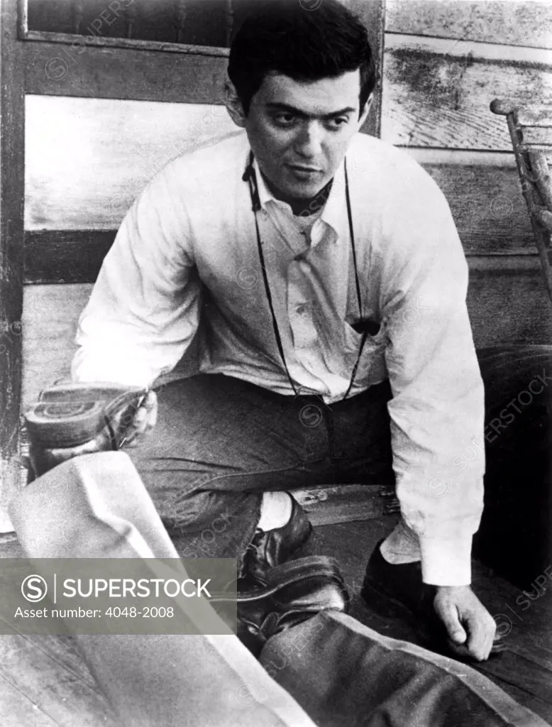 Stanley Kubrick on the set of his first film, FEAR AND DESIRE (1954). He was the writer, director and technical crew for this production.