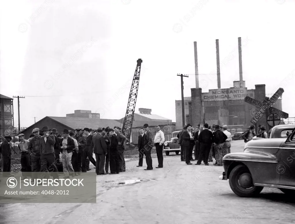 East St. Louis, ILL-Pickets at plant of Monsanto Chemical Company, where 750 members of A.F.L Federal Chemical Workers Union wnt on strike to enforce emands for closed shop and increased wages. The plant is a major producer of chemicals for national preparedness. 3-17-41